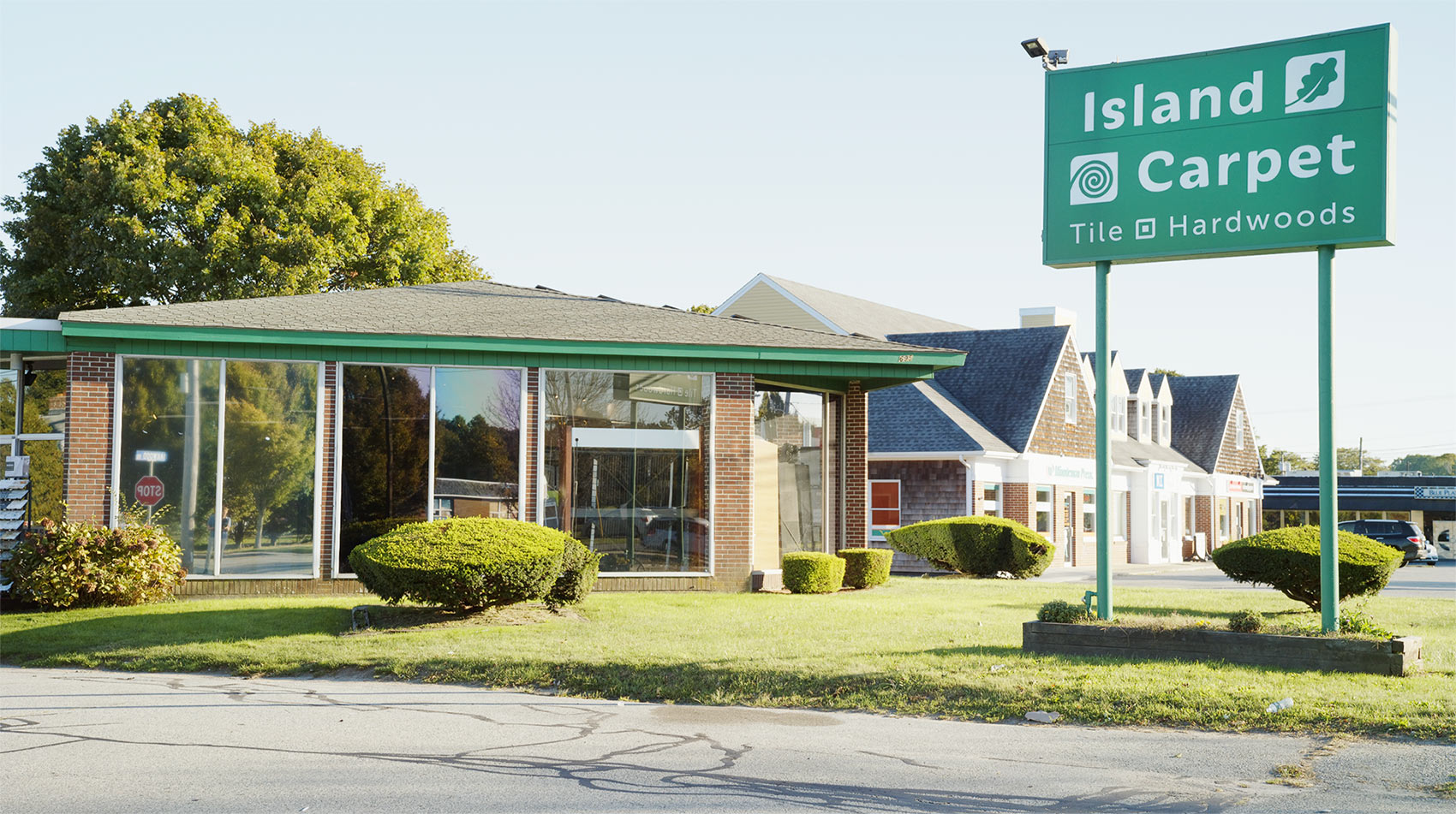 Island Carpet, Tile & Hardwoods showroom in Middletown, Rhode Island with flooring samples