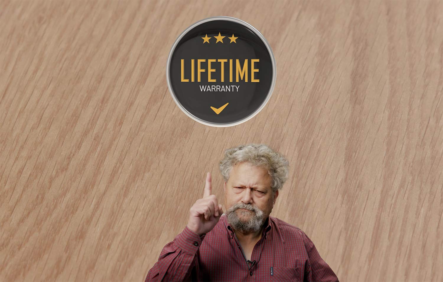 lifetime warranty graphic with hardwood floor background and man pointing at graphic