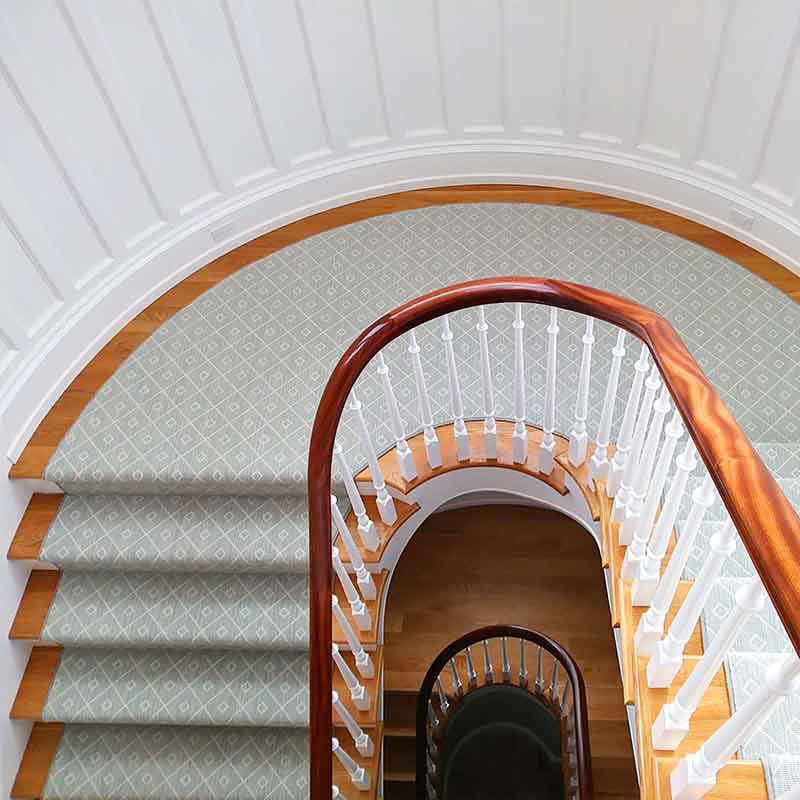 Green and white subtle pattern stair carpet