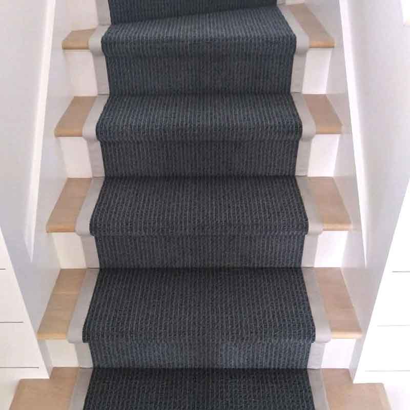 Navy blue stair carpet gray binding