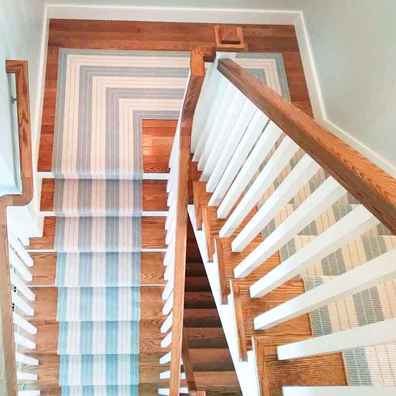 Teal and white striped stair carpet