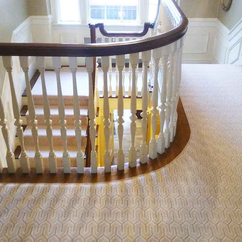 Elegant white and gray stair carpet with subtle pattern