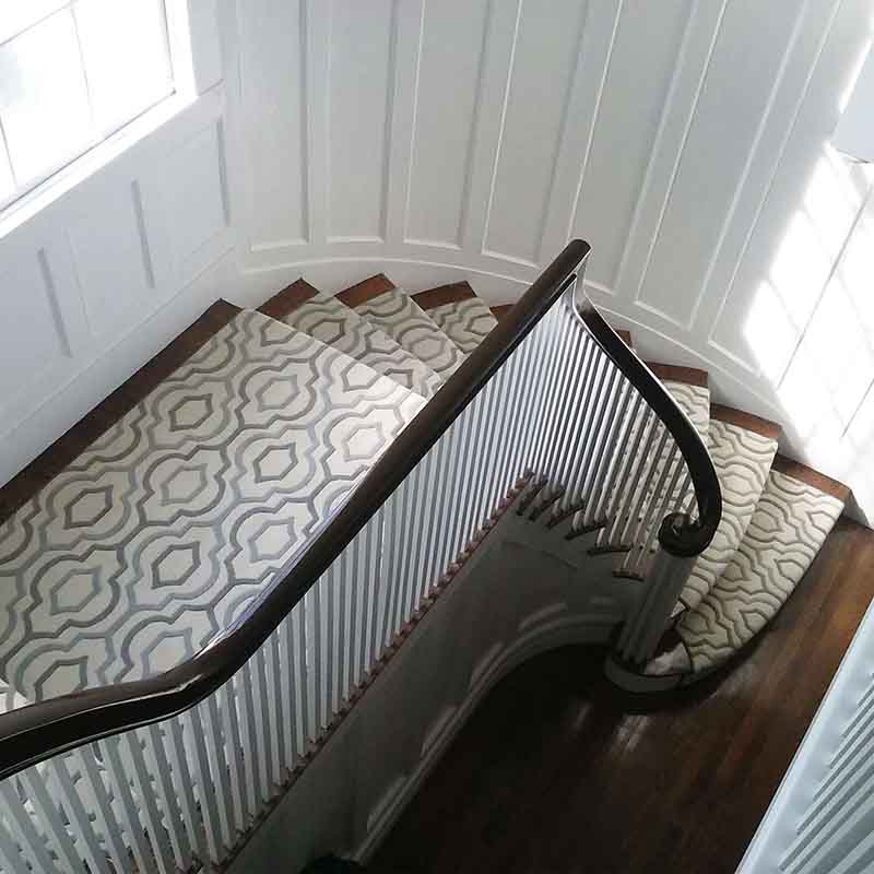 White and blue pattern stair carpet