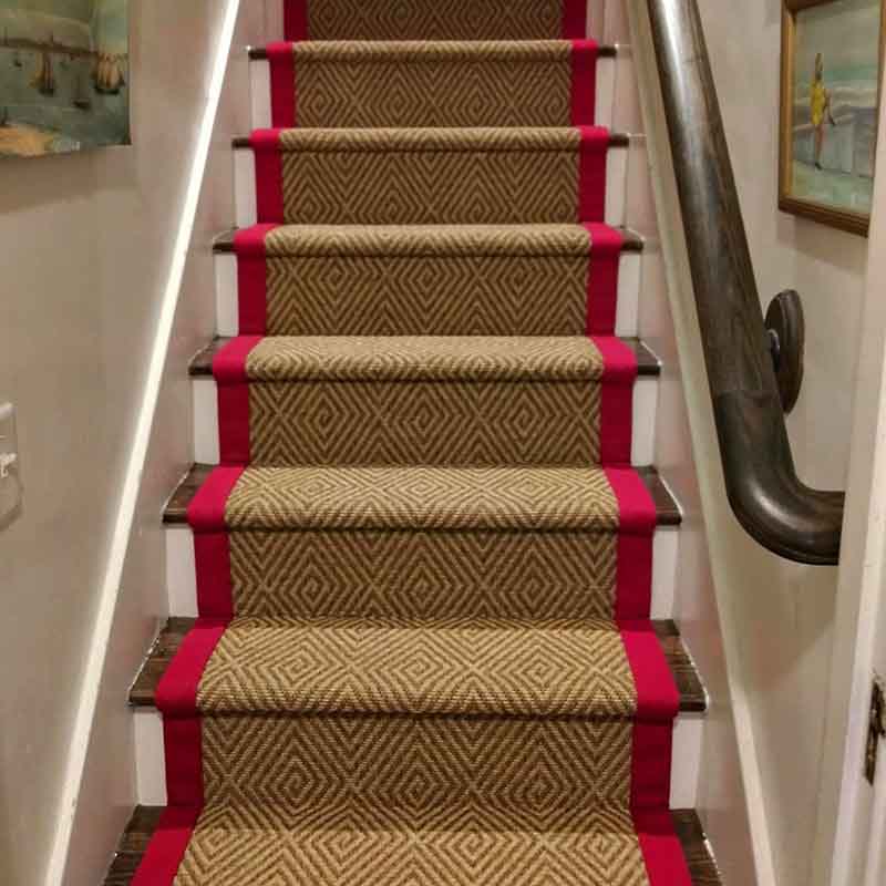 Sisal carpet stair runner with bright red binding